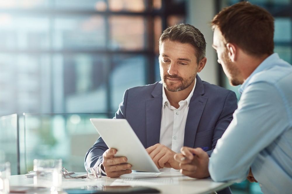 Two men talking business